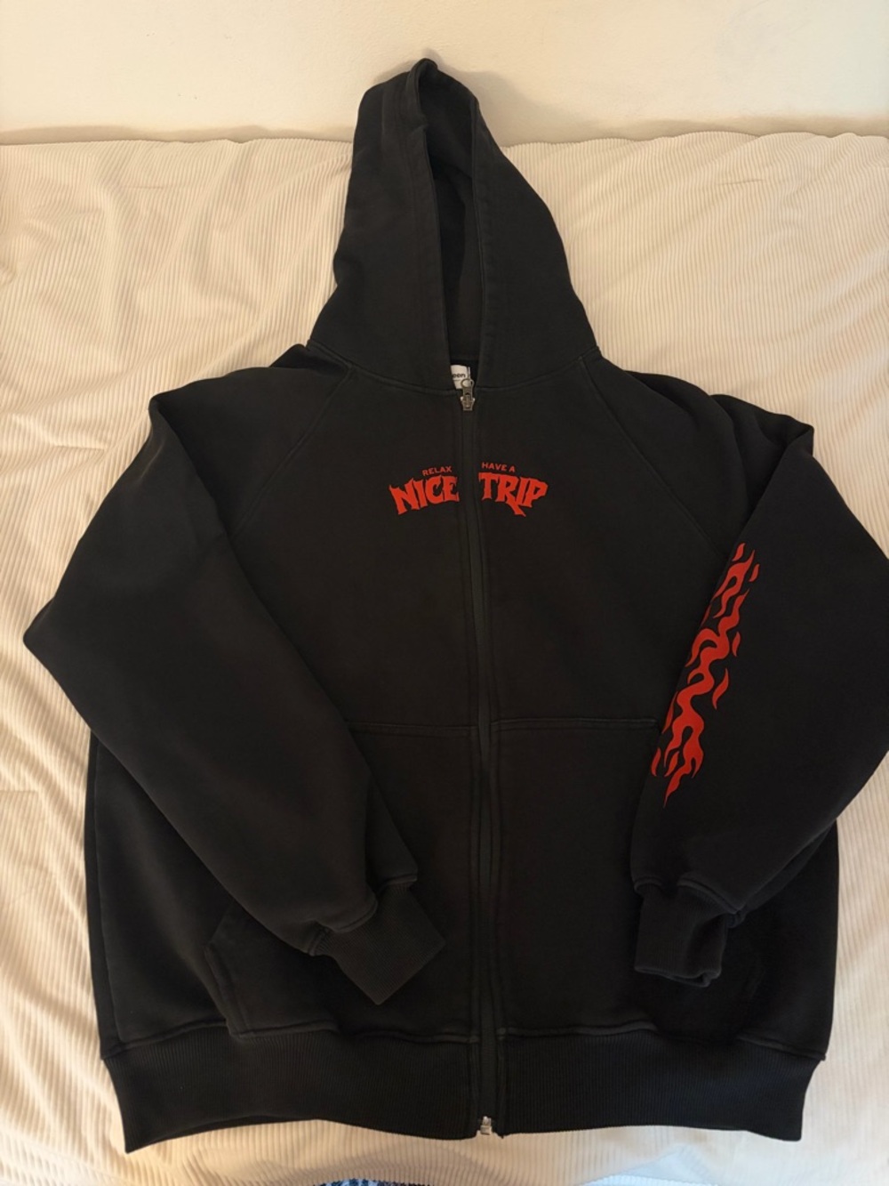 Black Zip-Up Hoodie with Red 'Nice Trip' Graphic